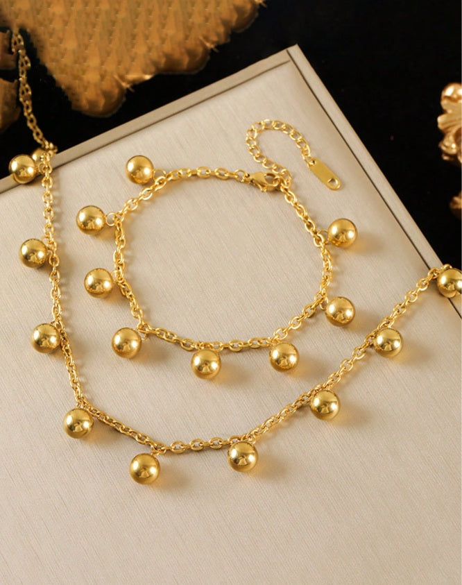 Golden Orbit Necklace & Bracelet Set